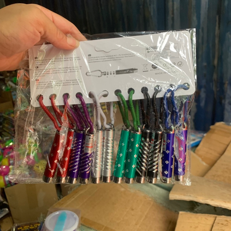 Vỉ 12 đèn laze móc khoá có 3 chế độ