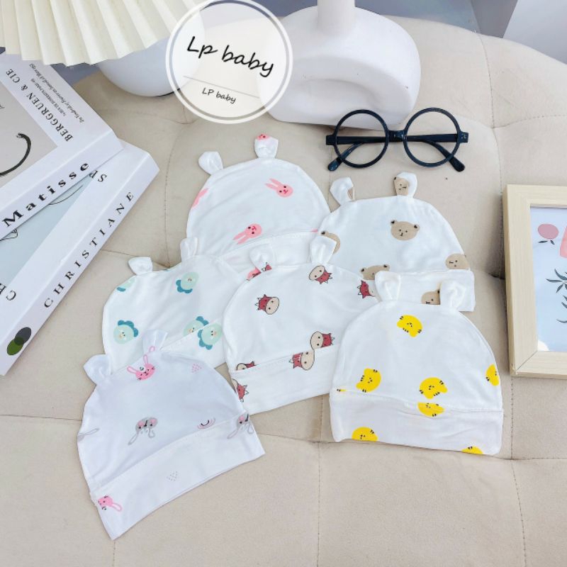 Mũ petti thun lạnh trắng hoạ tiết mềm mịn cho bé sơ sinh