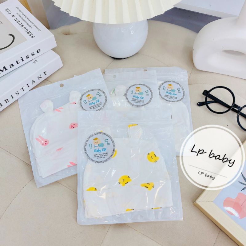 Mũ petti thun lạnh trắng hoạ tiết mềm mịn cho bé sơ sinh