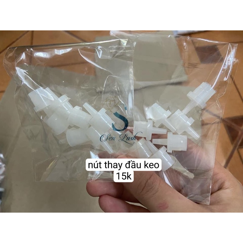 Nút đựng keo, nút thay đầu keo