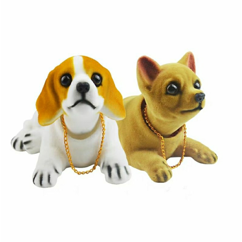 Chó Sphered lắc lư trên xe hơi, chó gật gù, chó lúc lắc, chó đặt taplo ô tô loại lông mịn