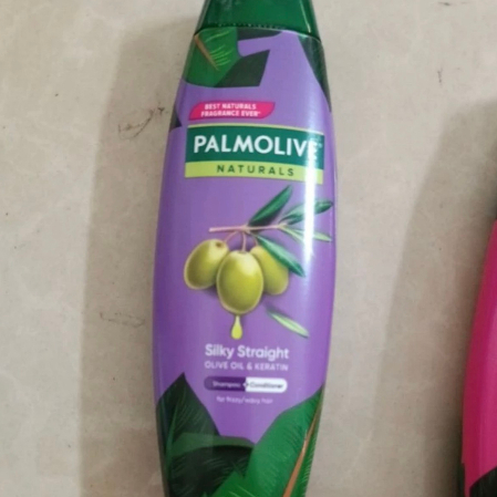 Chai dầu gội có dầu xả Palmolive chiết xuất thiên nhiên suôn mượt óng ả 180ml
