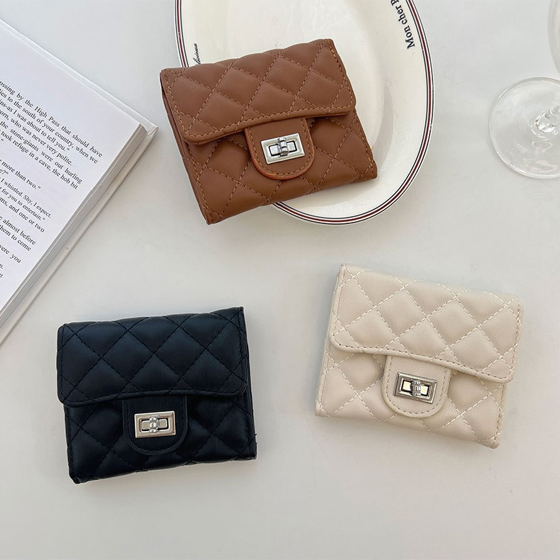 Ví cầm tay nhỏ gọn Laura da mềm họa tiết quả trám