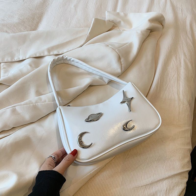 Túi xách kẹp nách da kèm sticker tag