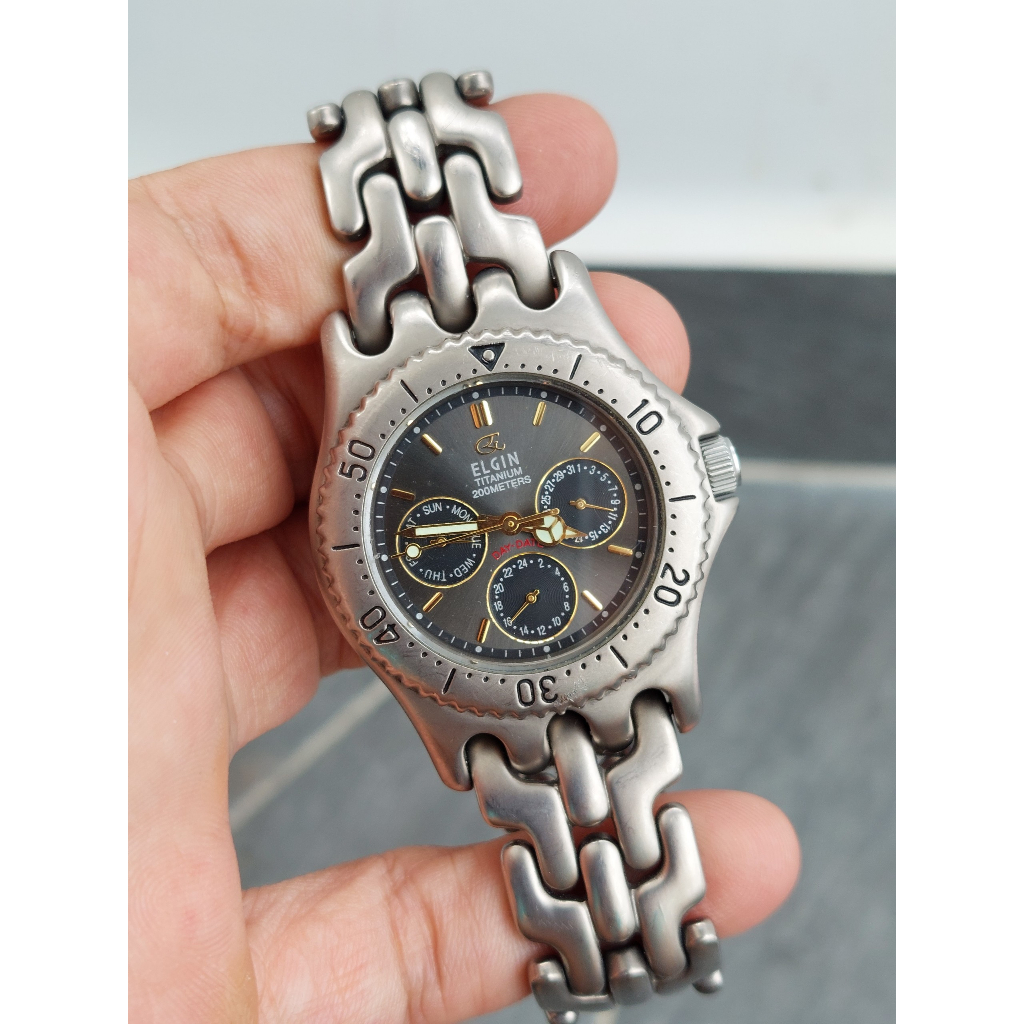 Đồng hồ nam Elgin 6 kim titan chạy pin hàng Si
