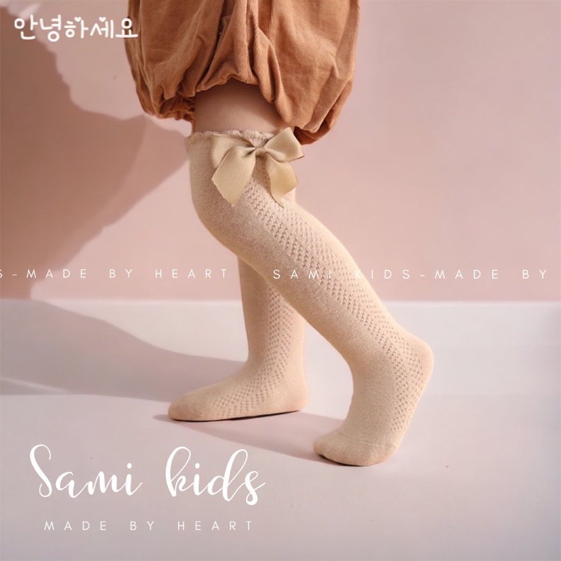 Tất vớ đùi gắn nơ cho bé 0-3y TNOD