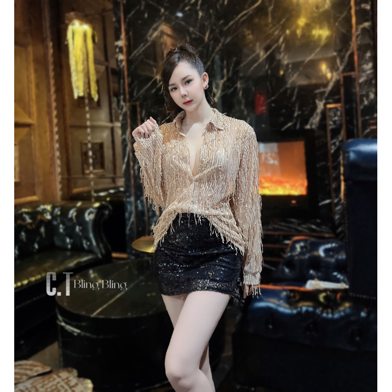 Áo sơmi kim sa tua rua