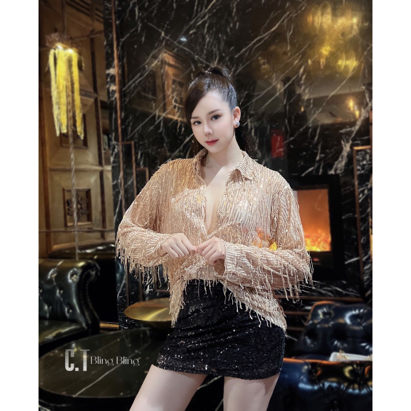 Áo sơmi kim sa tua rua