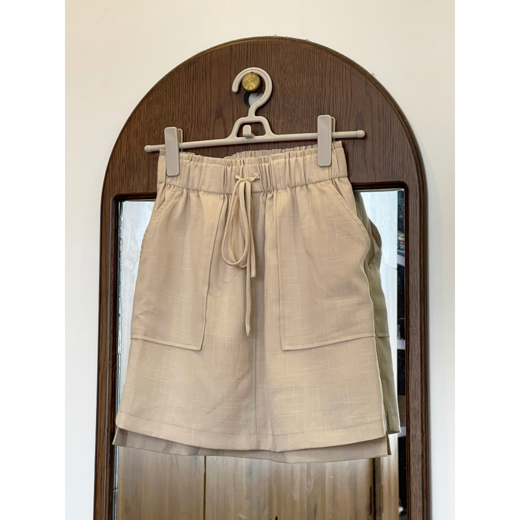 Pass Chân Váy Ngắn cạp chun chất đũi thoáng mát của Madelen