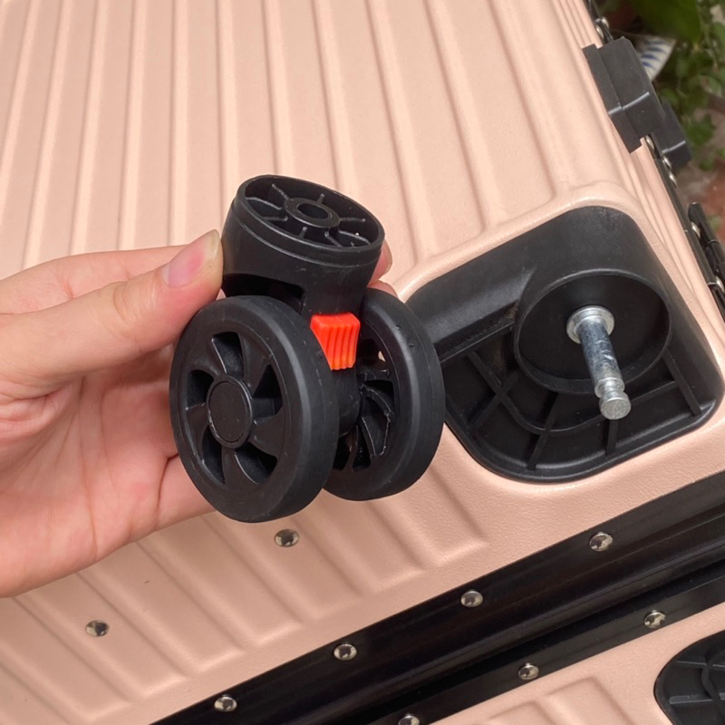 Bánh xe vali thay thế chốt màu đỏ dành cho VALI KHUNG NHÔM KHÓA SẬP