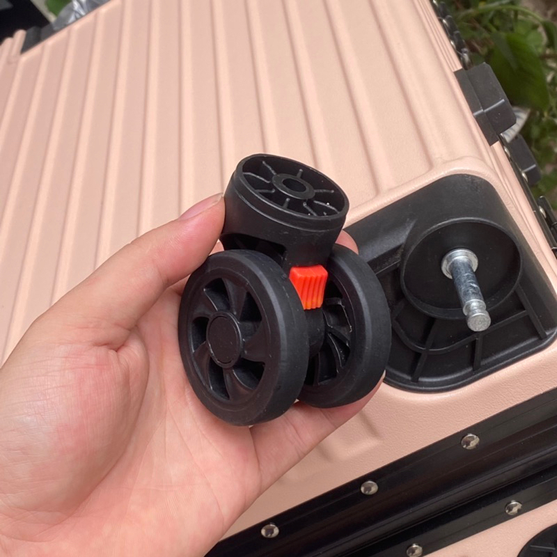 Bánh xe vali thay thế chốt màu đỏ dành cho VALI KHUNG NHÔM KHÓA SẬP