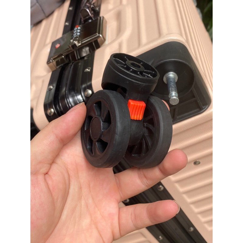 Bánh xe vali thay thế chốt màu đỏ dành cho VALI KHUNG NHÔM KHÓA SẬP