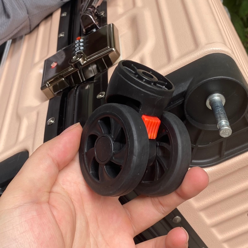 Bánh xe vali thay thế chốt màu đỏ dành cho VALI KHUNG NHÔM KHÓA SẬP