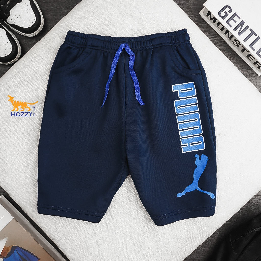 Quần short thun da cá bé trai