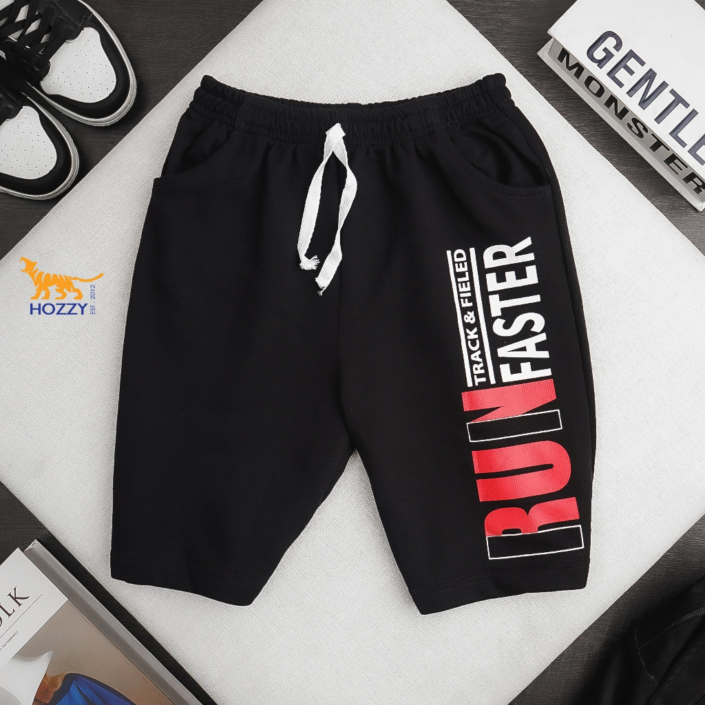 Quần short thun da cá bé trai