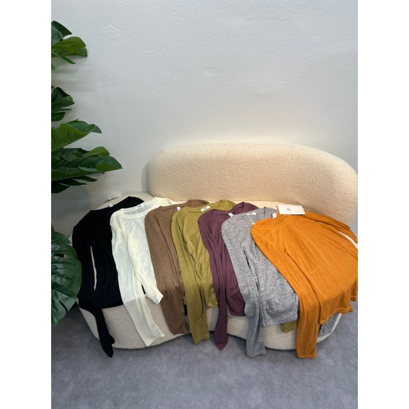 Áo thun giấy xỏ tay hàng QC