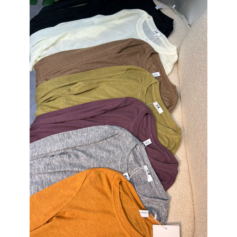 Áo thun giấy xỏ tay hàng QC