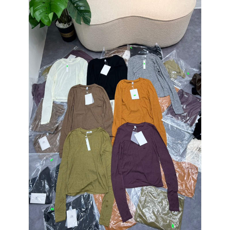 Áo thun giấy xỏ tay hàng QC