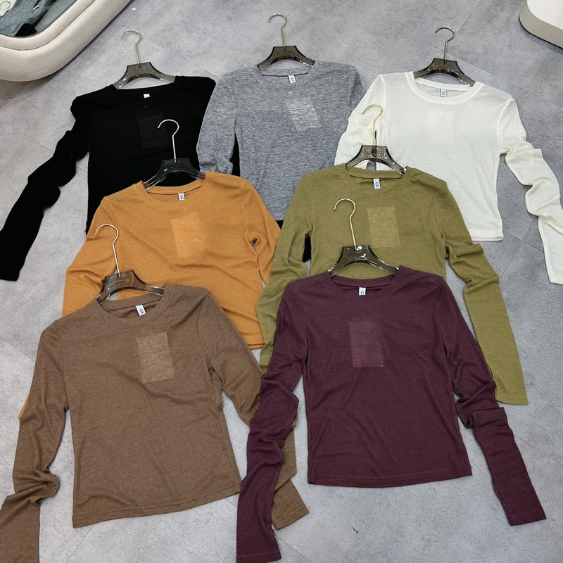 Áo thun giấy xỏ tay hàng QC