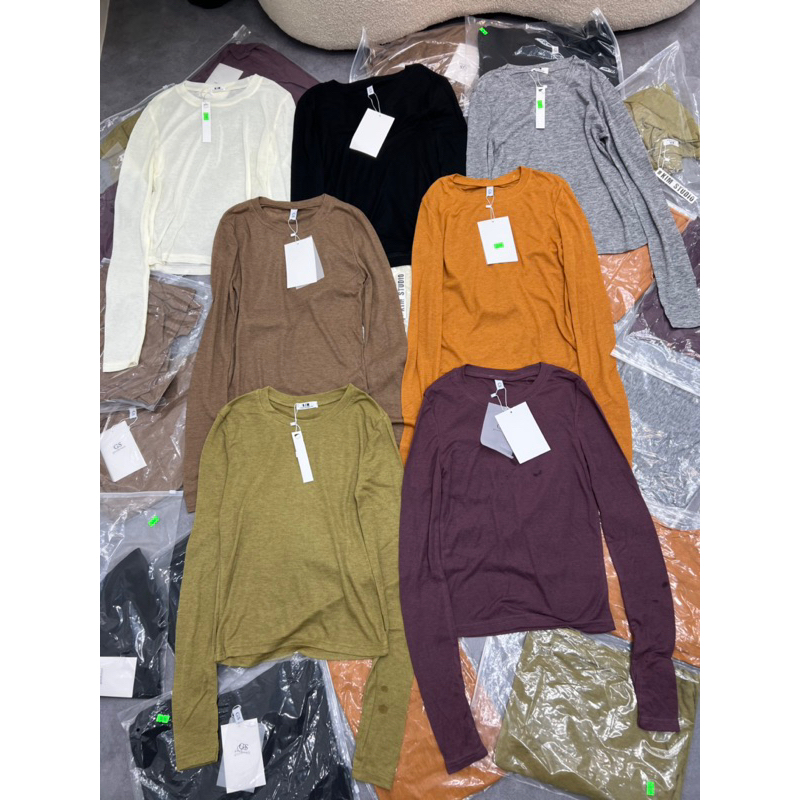 Áo thun giấy xỏ tay hàng QC