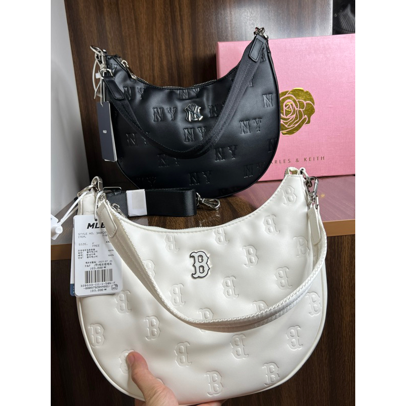 Túi kẹp nách m lb dáng tròn kèm dây đeo chéo