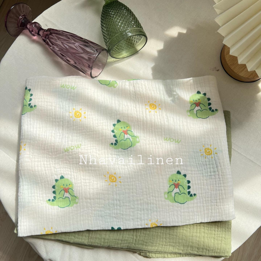 Vải xô muslin cao cấp 2 lớp hoạ tiết khủng long xanh mềm mịn thấm hút mồ hôi - Nhà vải linen