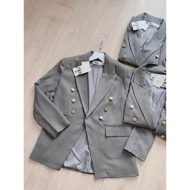 ÁO VEST GHI KHUY ĐỒNG