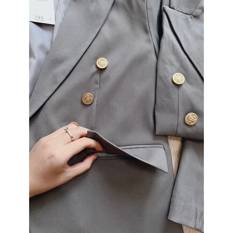 ÁO VEST GHI KHUY ĐỒNG