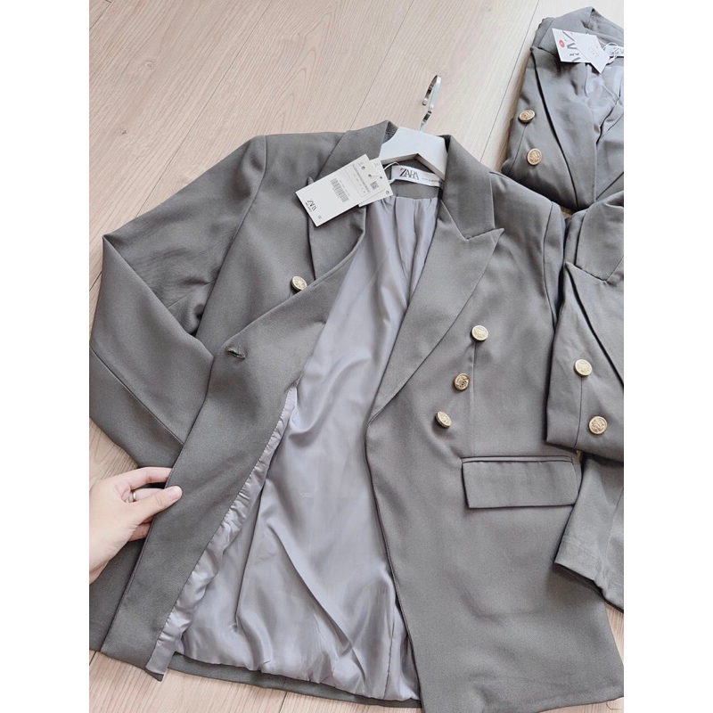 ÁO VEST GHI KHUY ĐỒNG