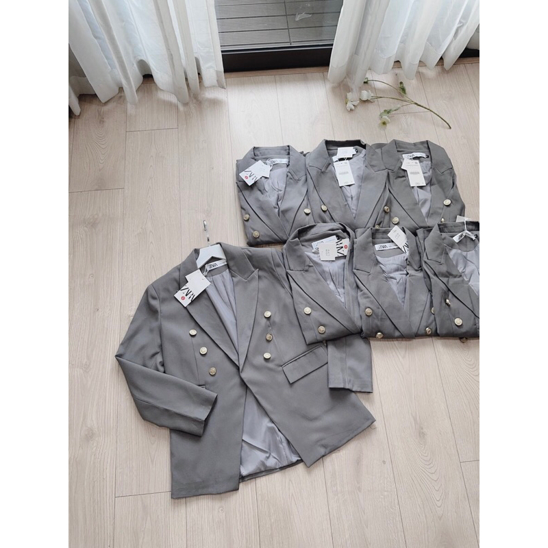 ÁO VEST GHI KHUY ĐỒNG