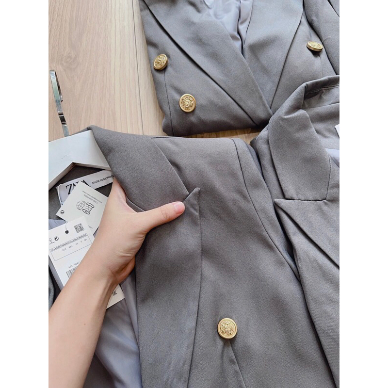 ÁO VEST GHI KHUY ĐỒNG