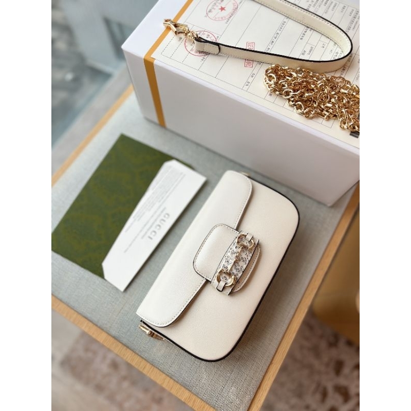 Túi xách dành cho nữ bản da thật 100% dáng ngang  sz24cm kèm 2 quai thay đổi kèm hộp nam châm