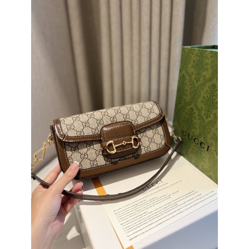 Túi xách dành cho nữ bản da thật 100% dáng ngang  sz24cm kèm 2 quai thay đổi kèm hộp nam châm