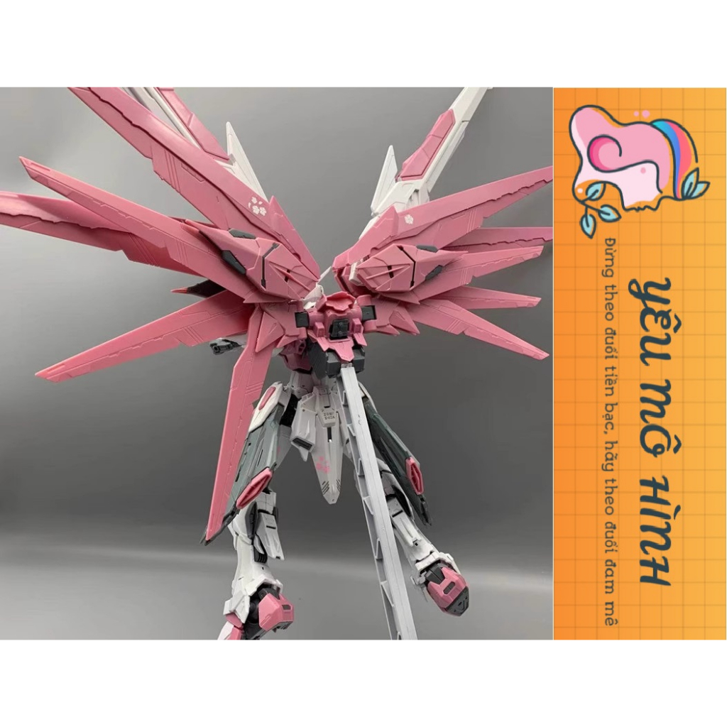 Gundam MG Sakura Pink Freedom VER.2.0 Tặng kèm Base trưng bày và Decal nước
