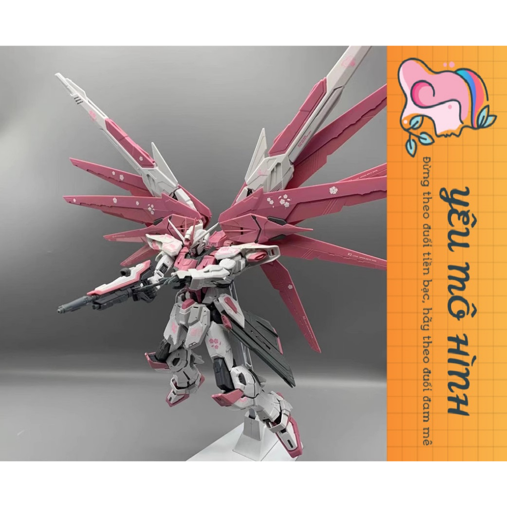 Gundam MG Sakura Pink Freedom VER.2.0 Tặng kèm Base trưng bày và Decal nước
