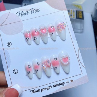 Nailbox thiết kế changgnails màu loang hồng đính đá nơ