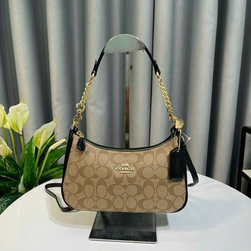 Túi C0ach teri dáng thuyền kẹp nách sang chảnh