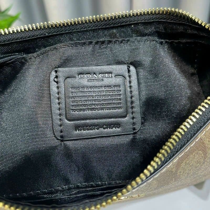 Túi C0ach teri dáng thuyền kẹp nách sang chảnh