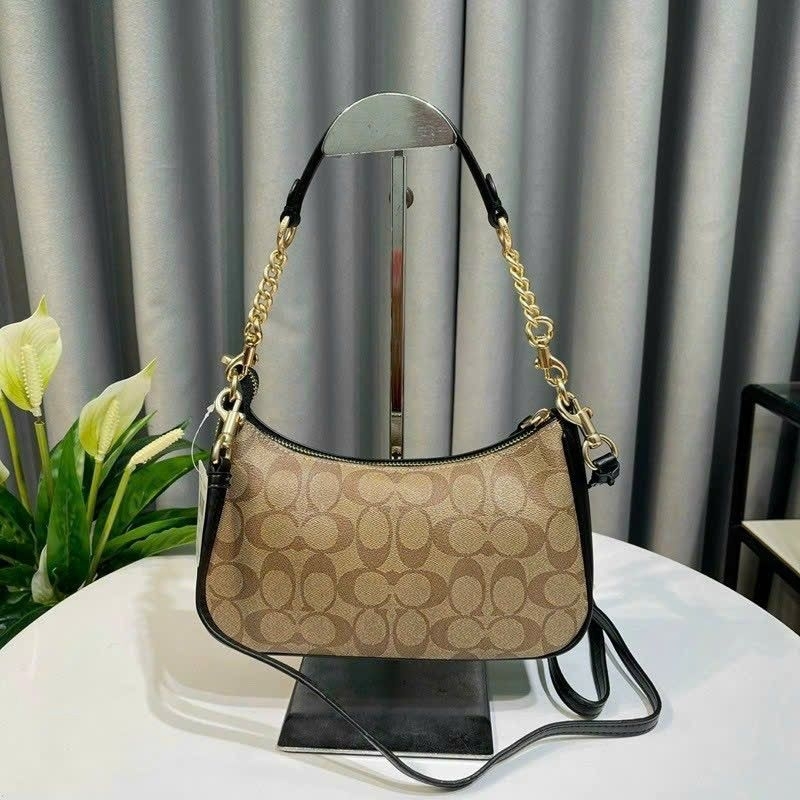 Túi C0ach teri dáng thuyền kẹp nách sang chảnh