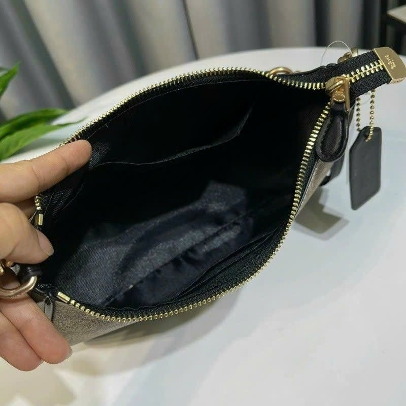 Túi C0ach teri dáng thuyền kẹp nách sang chảnh