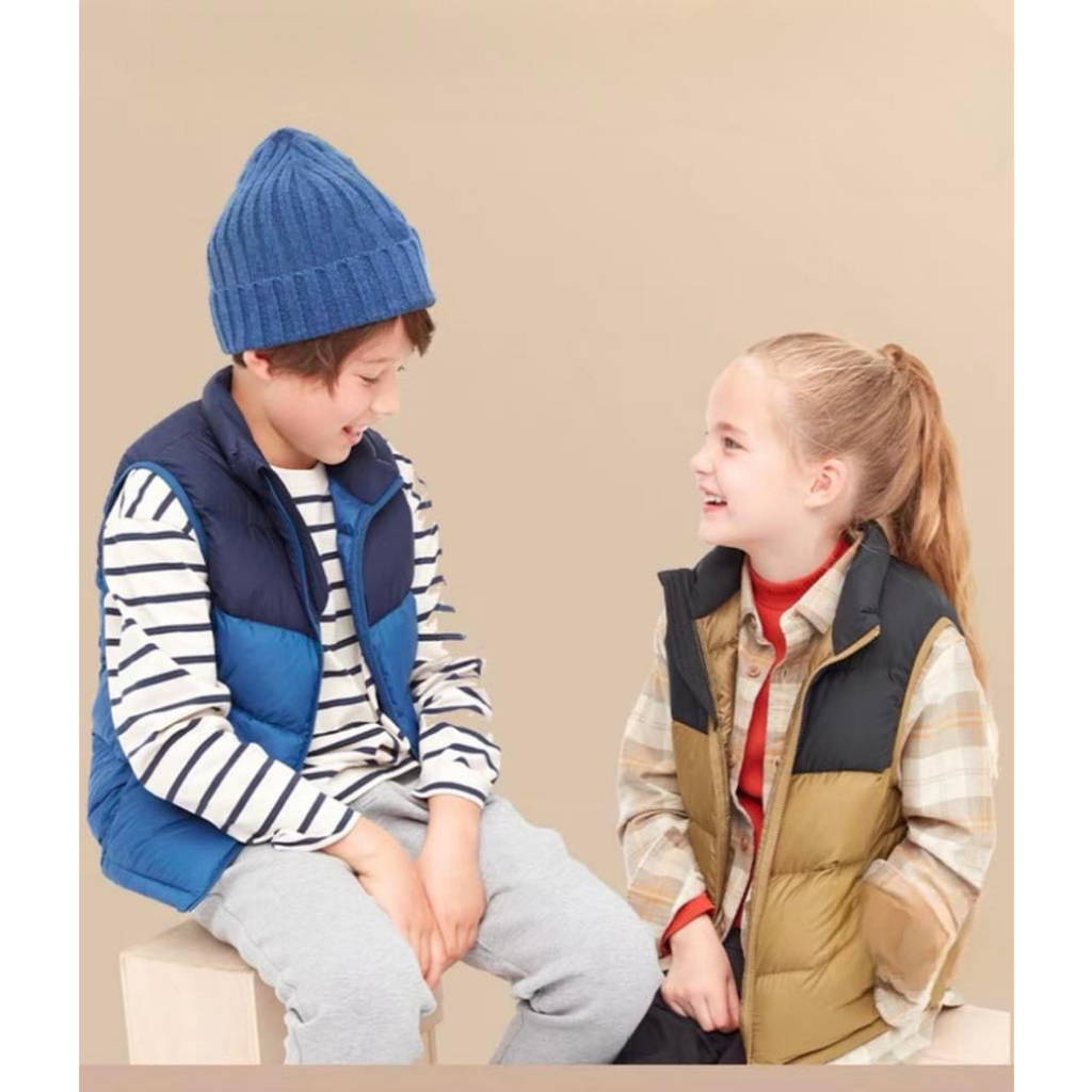 Áo gile phao lông vũ Uni phối màu