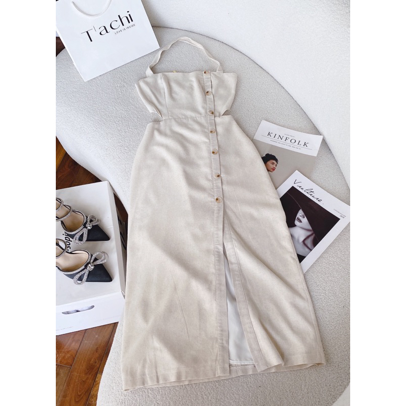 Đầm yến midi kem xẻ đùi nút lệch cut-out lưng