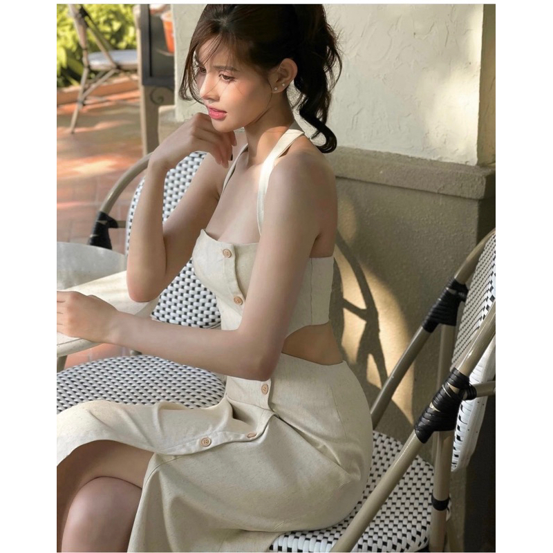 Đầm yến midi kem xẻ đùi nút lệch cut-out lưng