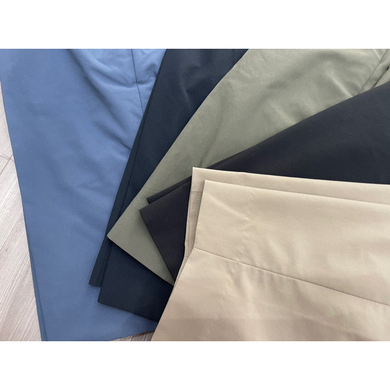 Quần sooc golf adam Scott uniqlo