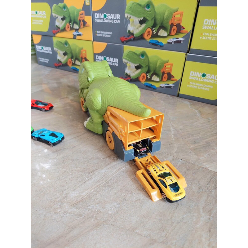Đồ chơi khủng long nuốt ô tô