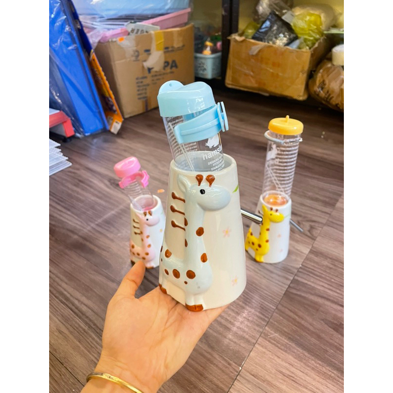 Đế Sứ Bình nước hình Khủng Long xinh xắn cho hamster chống cắn cạp .