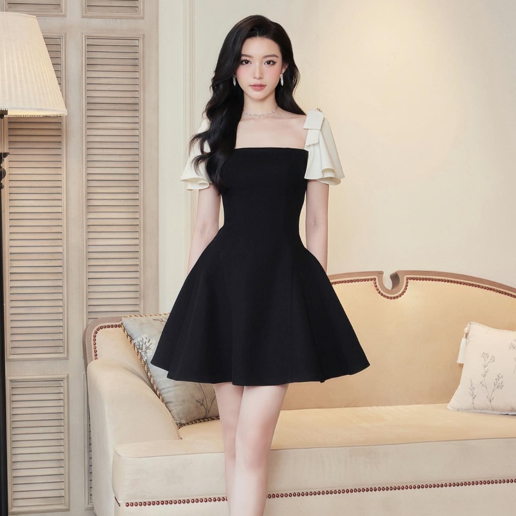 Váy đen xòe tay nơ phối kem xinh trẻ trung Váy Thiết kế đen xòe