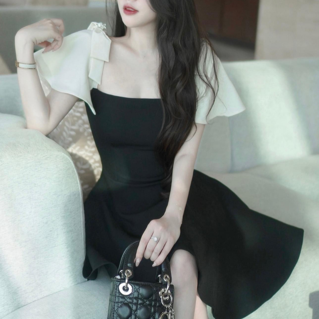 Váy đen xòe tay nơ phối kem xinh trẻ trung Váy Thiết kế đen xòe