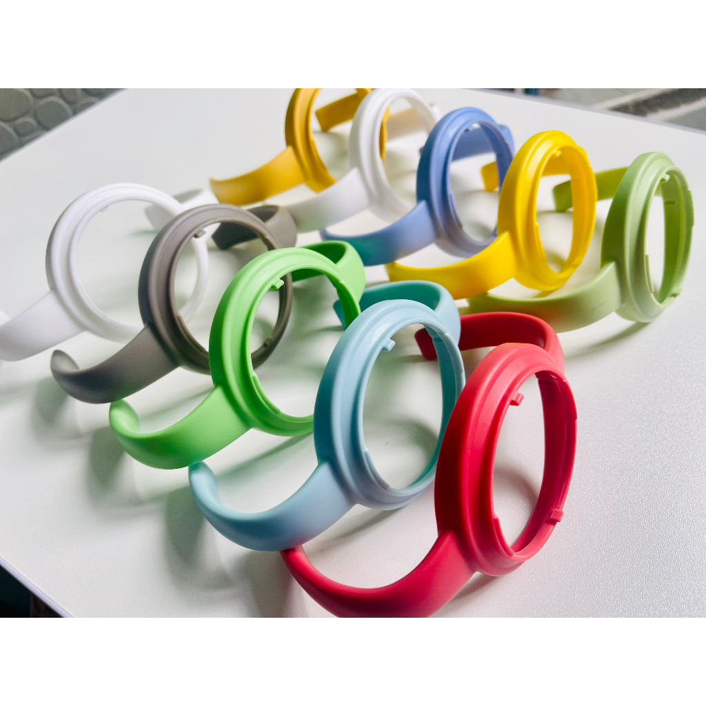 Tay cầm bình sữa Pigeon va Moyuum nhựa dẻo,và nhựa cứng