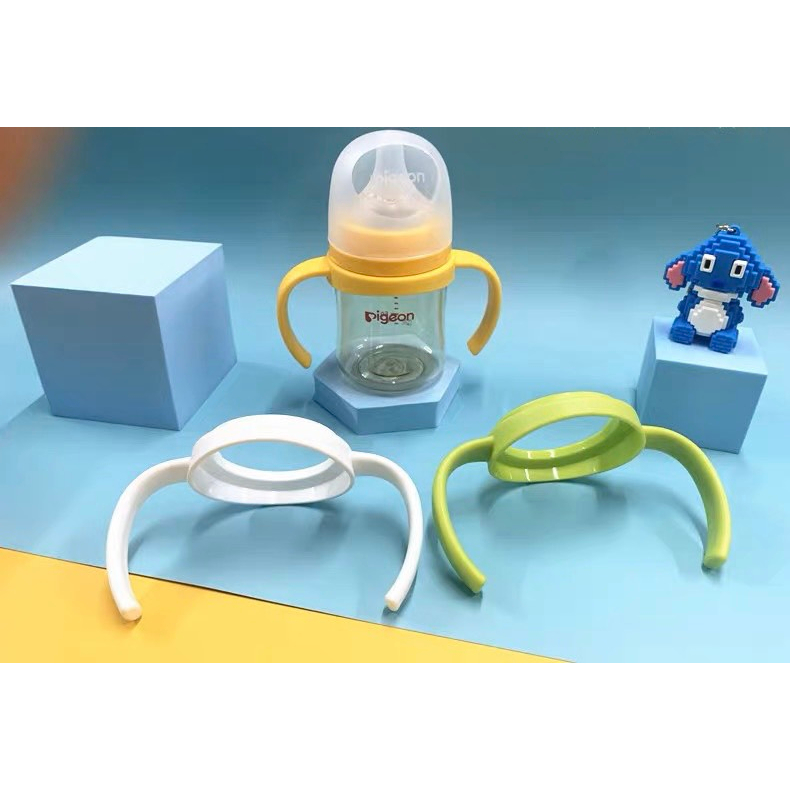 Tay cầm bình sữa Pigeon va Moyuum nhựa dẻo,và nhựa cứng